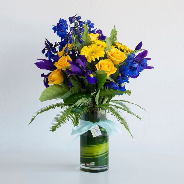 Blue and yellow vase arrangement