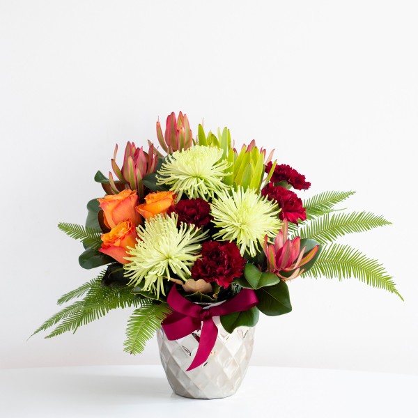 colourful mix in silver vase